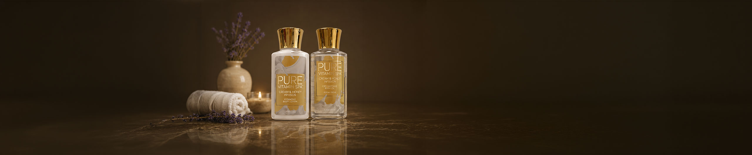 Pure Vitamin Spa massage oil and lotion bottles